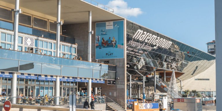 Centre Comercial Maremagnum Barcelona waterfront shopping mall with sea views, restaurants, and Rambla de Mar bridge