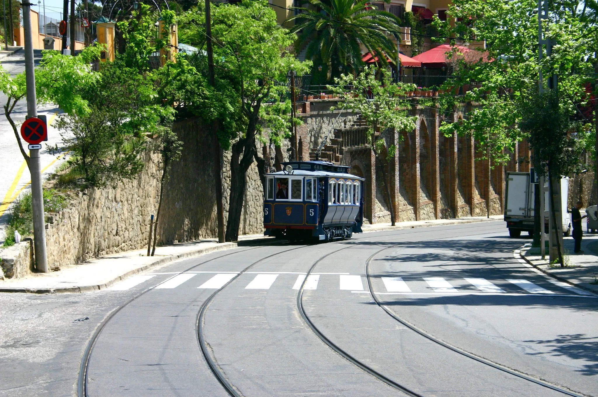 Avinguda del Tibidabo Barcelona scenic avenue with historic blue tram luxury villas and panoramic city views