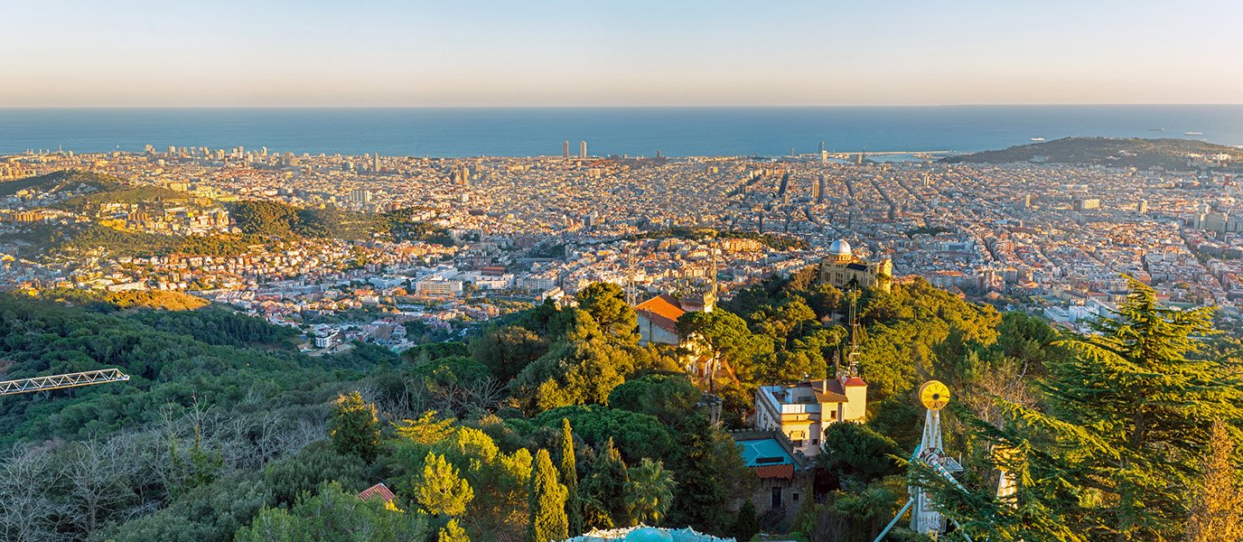 Monte Tibidabo Barcelona panoramic travel infographic showing Temple of the Sacred Heart, Tibidabo amusement park, sunset views, hiking trails, and transport guide in 2026 travel guide