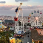 Tibidabo Barcelona tickets 2026 infographic showing amusement park rides, panoramic skyline views, ticket prices, transport tips, and visitor guide.