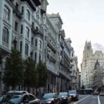 Infographic showing Spain weather in April 2026, including temperatures, beaches, festivals, rainfall, packing tips, and the best cities and islands to visit during spring.