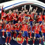 Spain football infographic showing the best football cities, famous stadiums, travel tips, local food, transportation, and the best time to visit Spain for an unforgettable football trip.