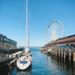 Person enjoying the Seattle skyline with the Space Needle in the background, perfect for Seattle Instagram captions and travel inspiration.